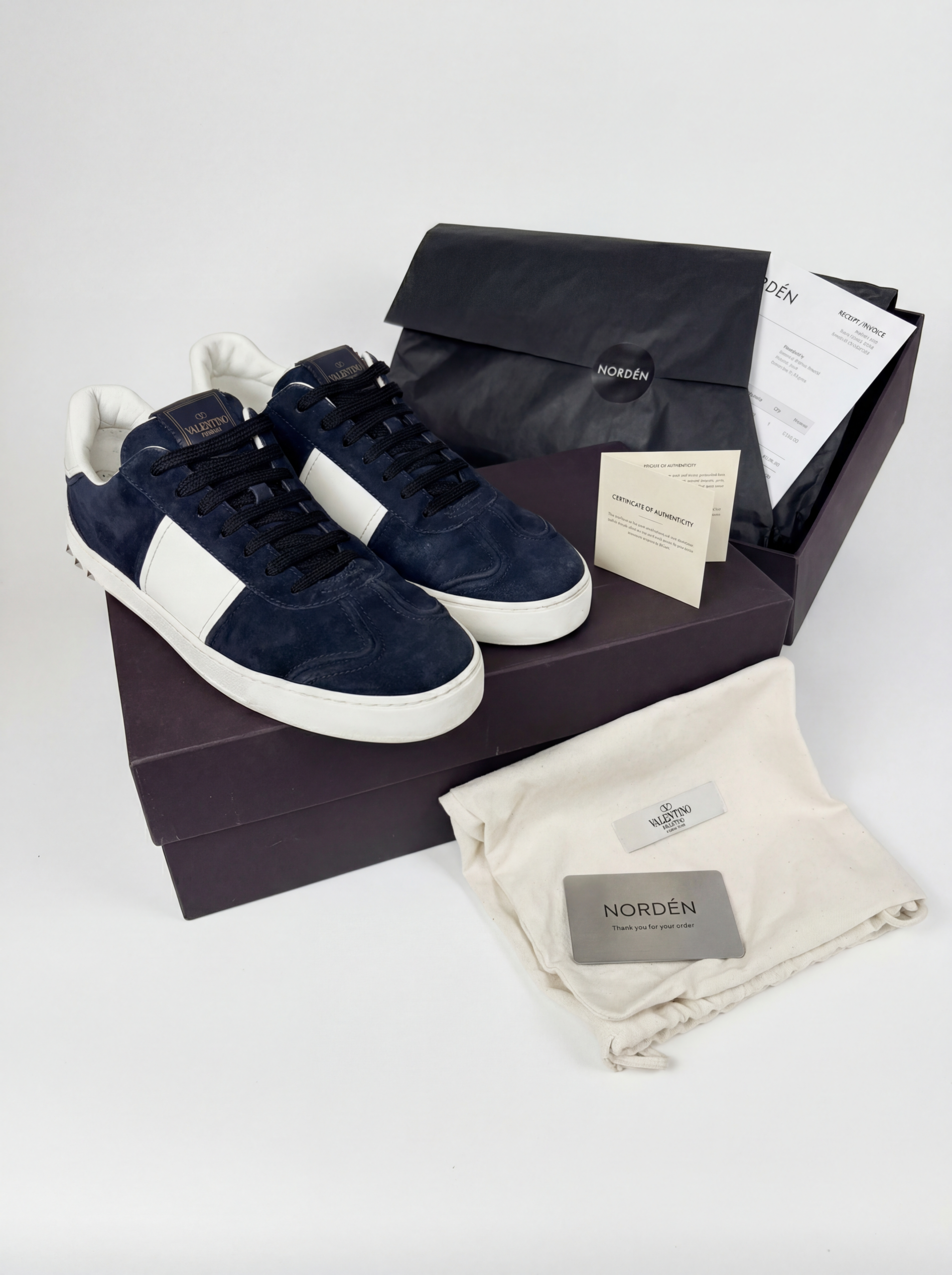 Nordén order contents — authentication certificate, packaging, dust bag