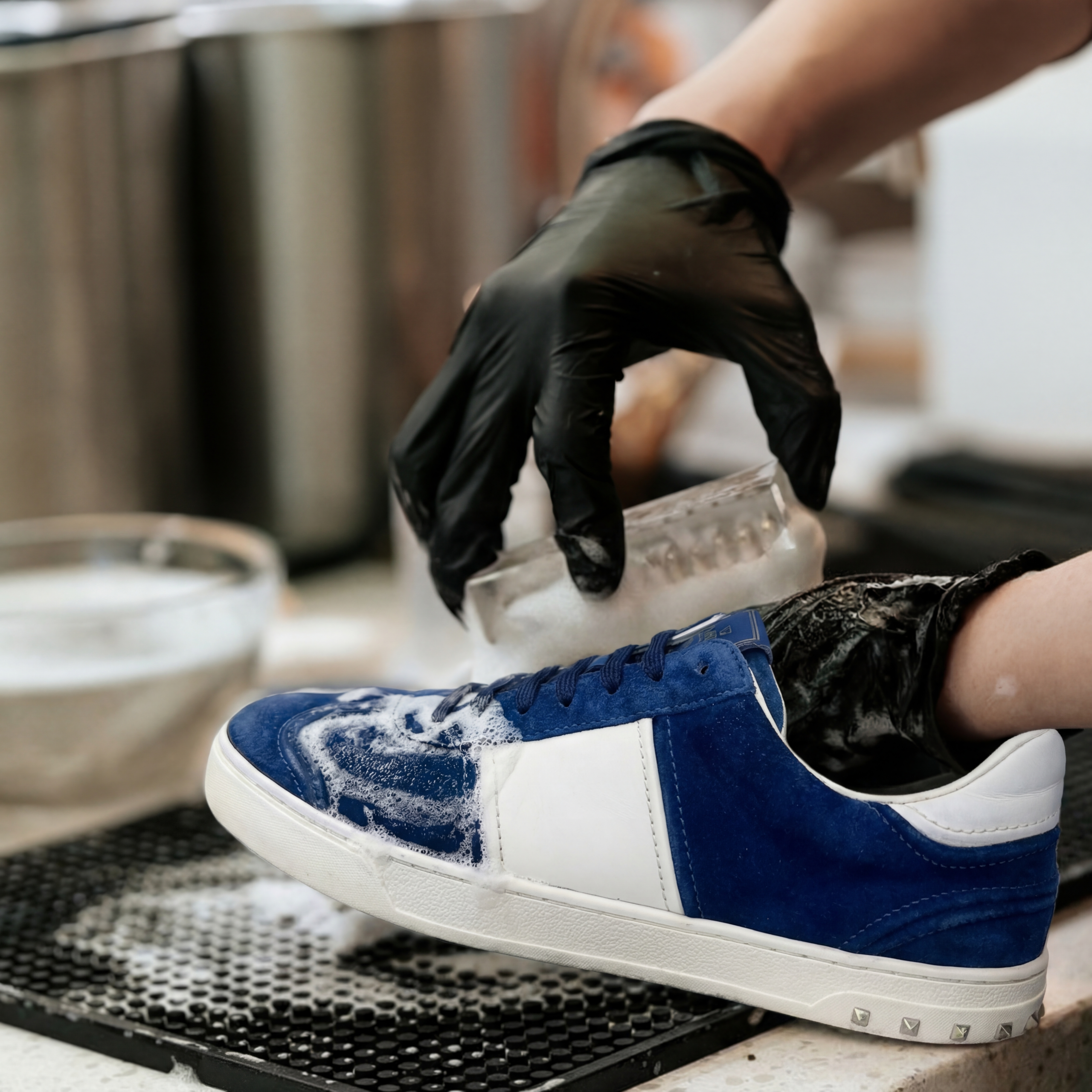 Craftsman repairing shoes